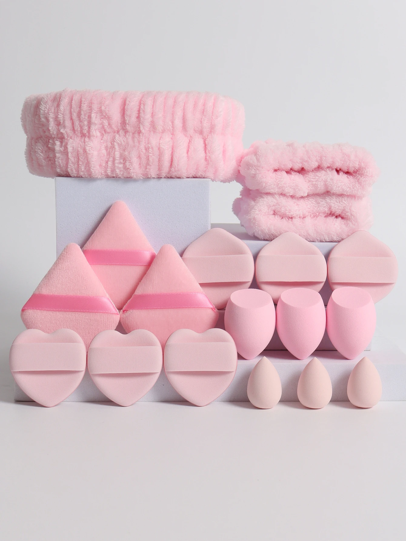 18 Piece Headband Set. 1 Hair Band & 2 Wrist Bands & 3 Make-Up Sponges & 3 Mini Square Air Cushions & 3 Triangular Powder Puff &