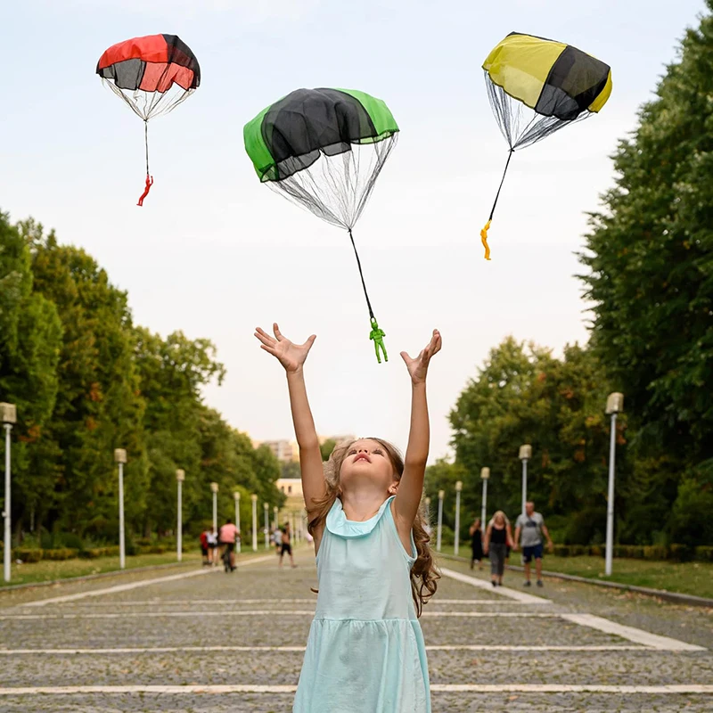 Children throwing mini soldier parachute toys indoor and outdoor toys hand throwing parachute toys parent-child interactive game