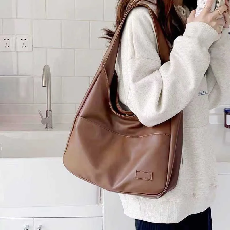 Large Capacity Tote Bag, New Black Leather Simple Casual Commuting Women's Bag, Fashionable and Versatile Single Shoulder Bag