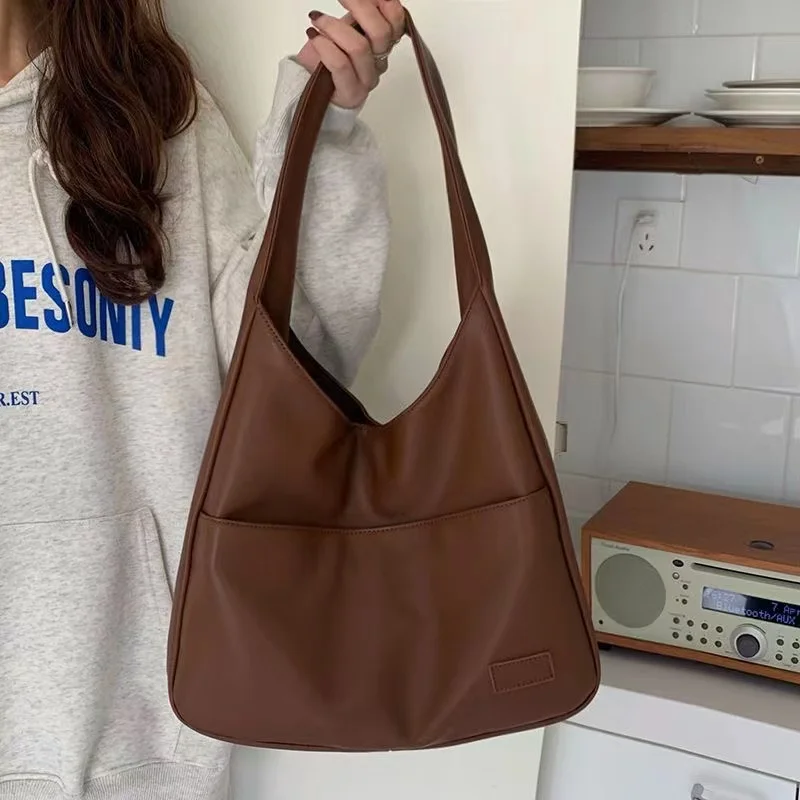 Large Capacity Tote Bag, New Black Leather Simple Casual Commuting Women's Bag, Fashionable and Versatile Single Shoulder Bag