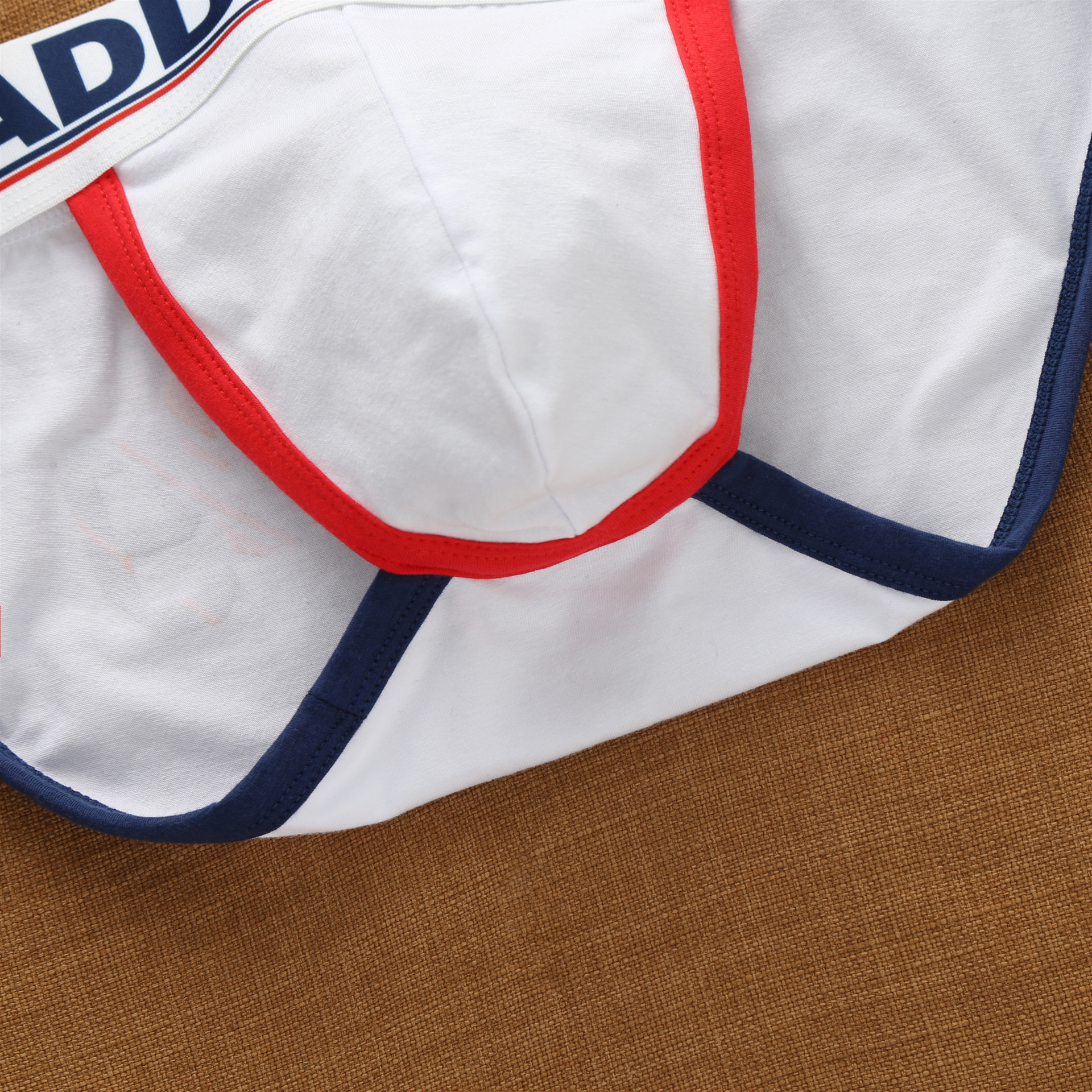 Addicted men's sexy underwear with high cross letters and low waist fashion loose cotton tide Korean briefs