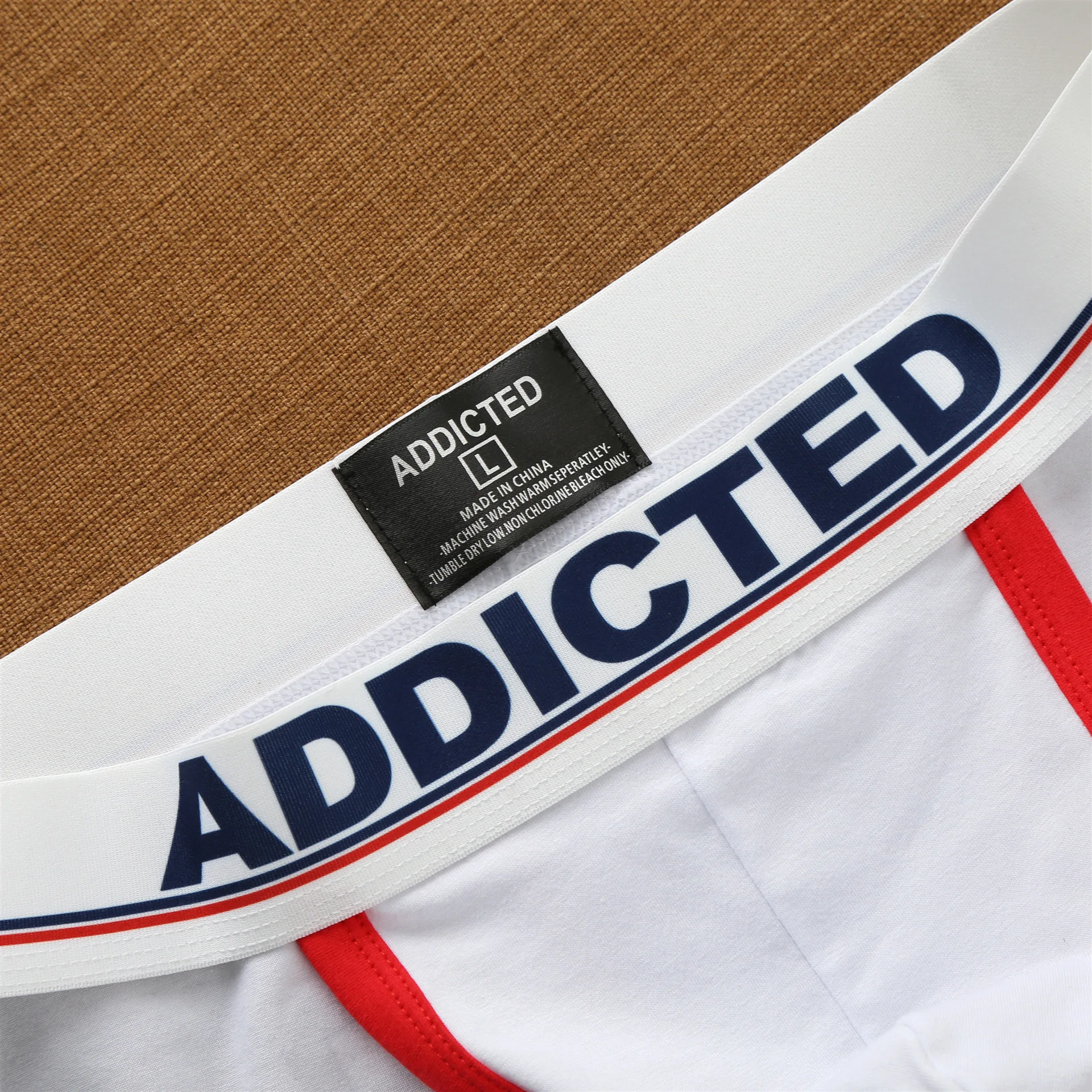 Addicted men's sexy underwear with high cross letters and low waist fashion loose cotton tide Korean briefs