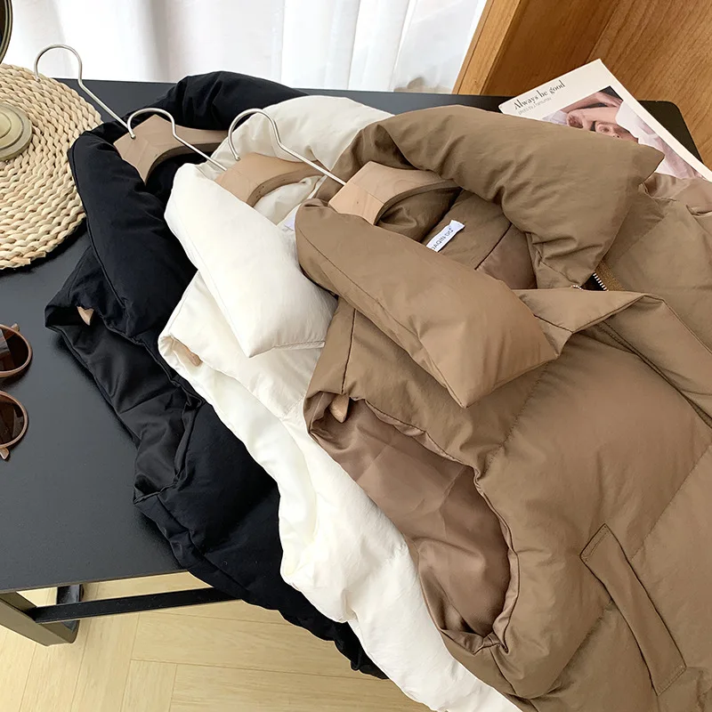 Women Fashion Autumn New 2024 Stand Collar Elegant Down Coats Warm Outerwear Casual Belt Sleeveless Winter Women Vests Jackets