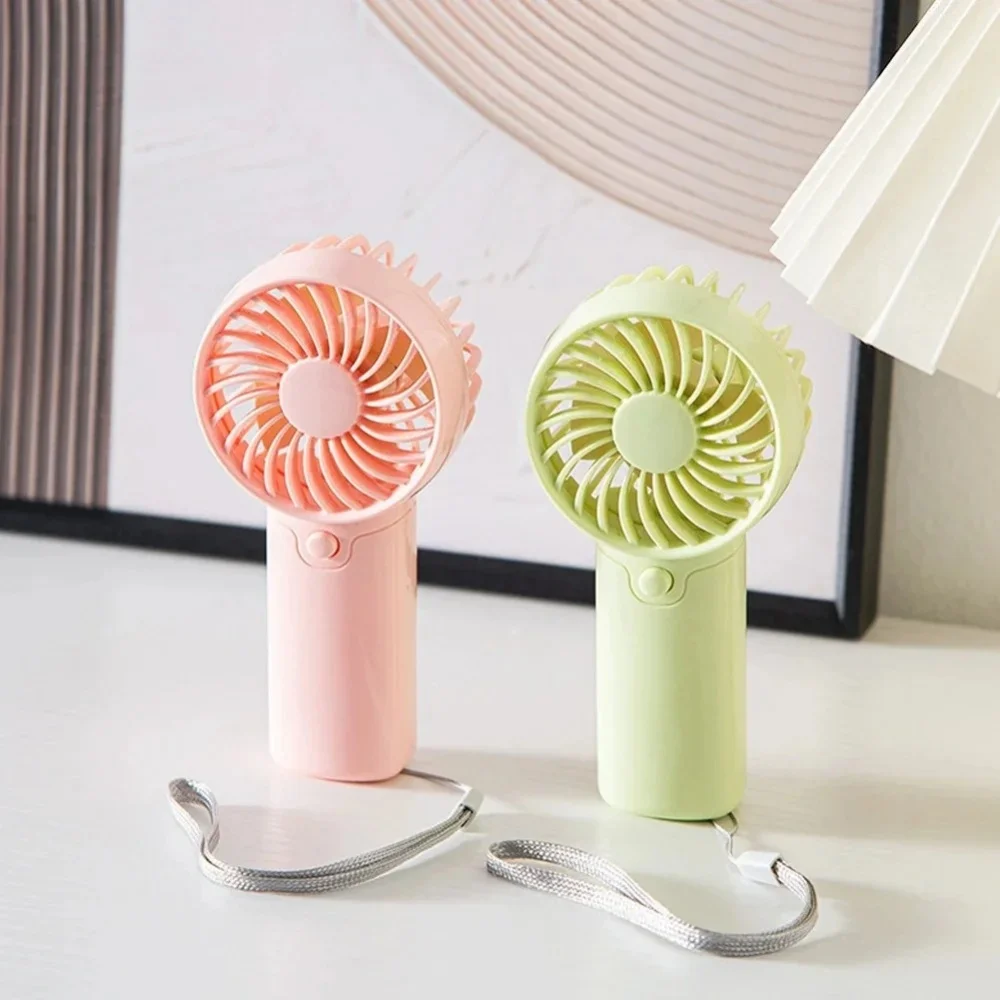 1PCMini Portable Fan AAA Battery Handheld Fan For Men Women Creative Small Fan Air Cooler Perfect For Office Outdoor Travel