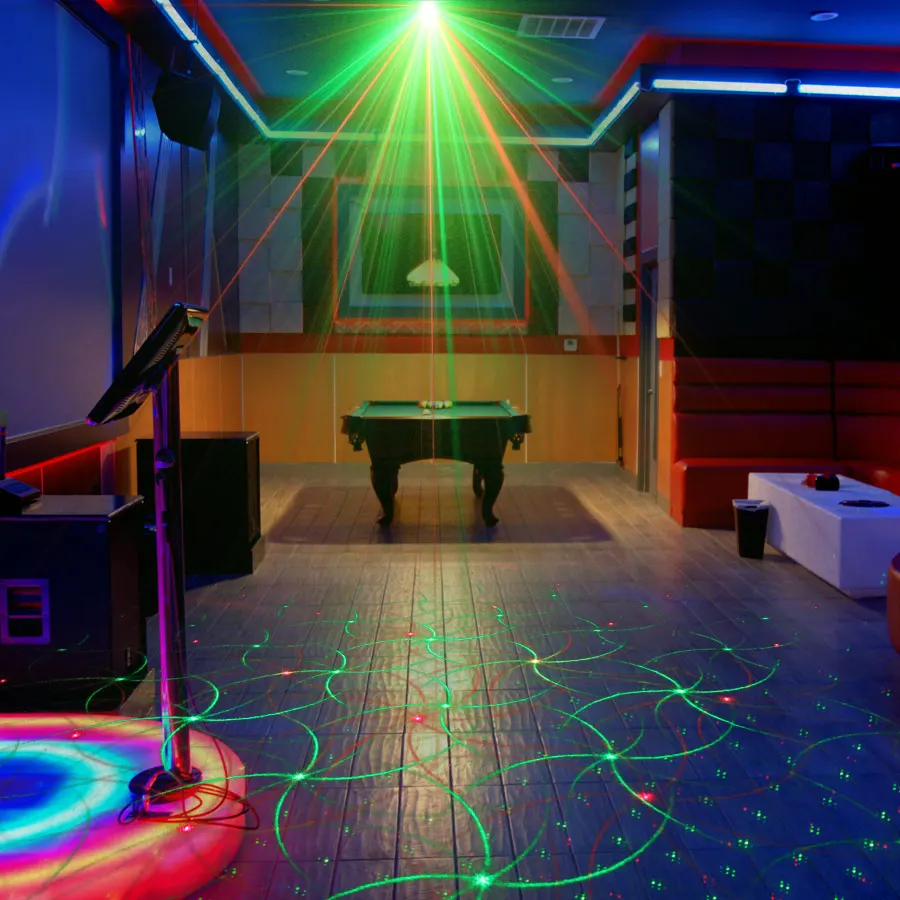 Mini R&G Moving 4 Patterns Laser Projector Disco Light DJ Bar Dance House Party Christmas Flash Stage Lamp Show YR4