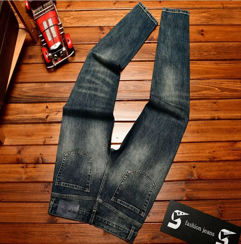 High end jeans men with ripped holes, street fashion prints,, small feet, elastic, retro and handsome pants