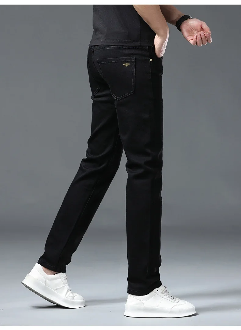 Pure black jeans for men, simple, fashionable, light luxury, trendy, stretchy, slim fit, high-end, versatile denim long pants