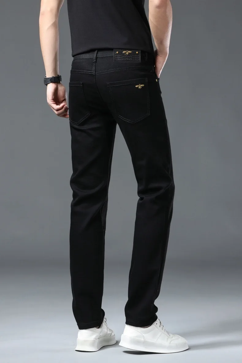 Pure black jeans for men, simple, fashionable, light luxury, trendy, stretchy, slim fit, high-end, versatile denim long pants