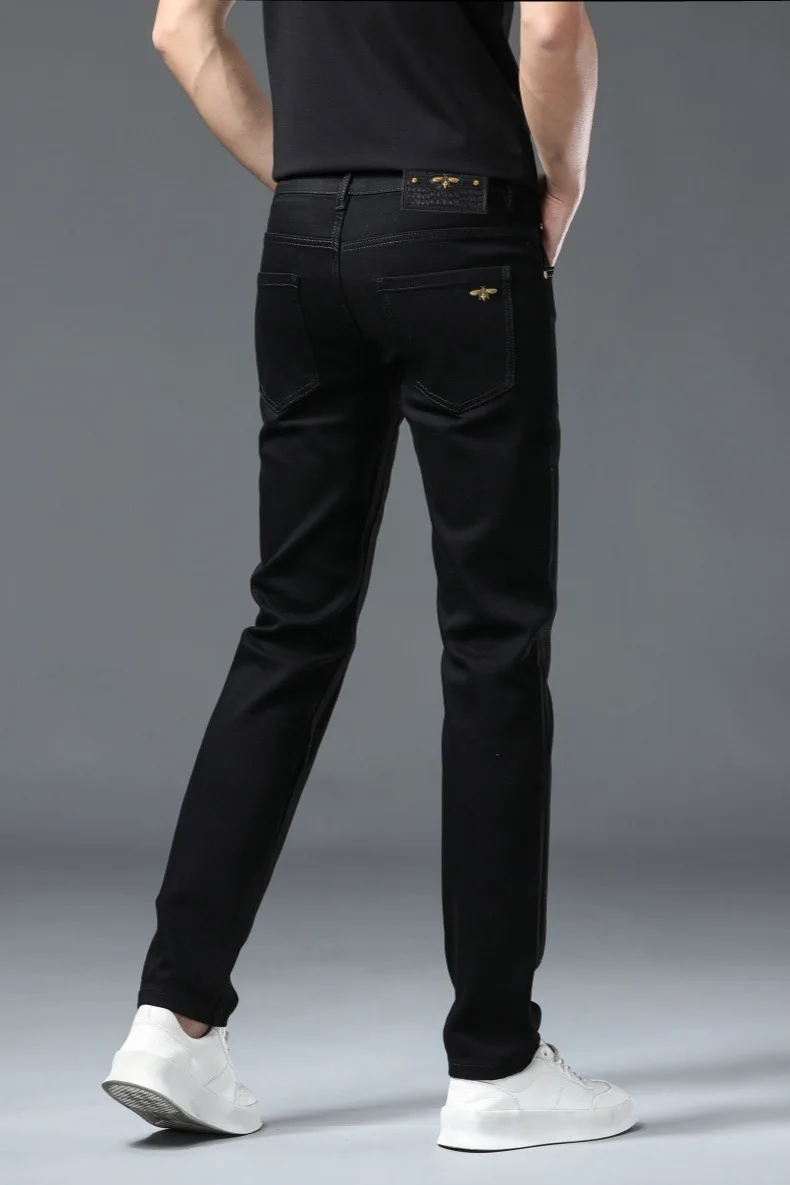 Pure black jeans for men, simple, fashionable, light luxury, trendy, stretchy, slim fit, high-end, versatile denim long pants