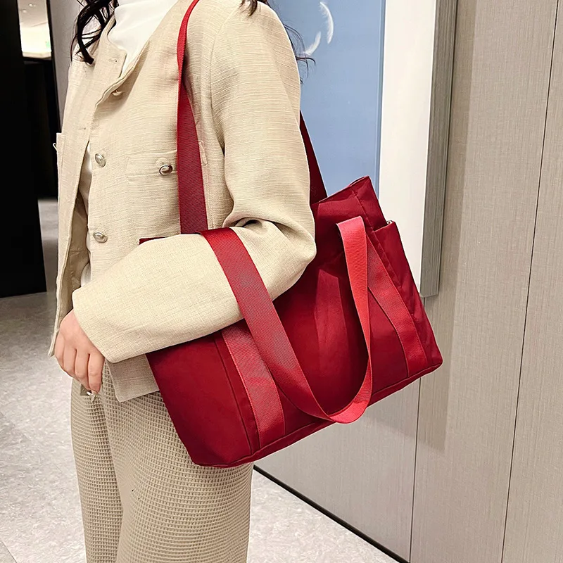 Women's Bag Designer Luxury Bag Nylon Commuting Shoulder Handbag Solid Color Tote Bag Mommy Large Capacity Vacation Handbag 2026