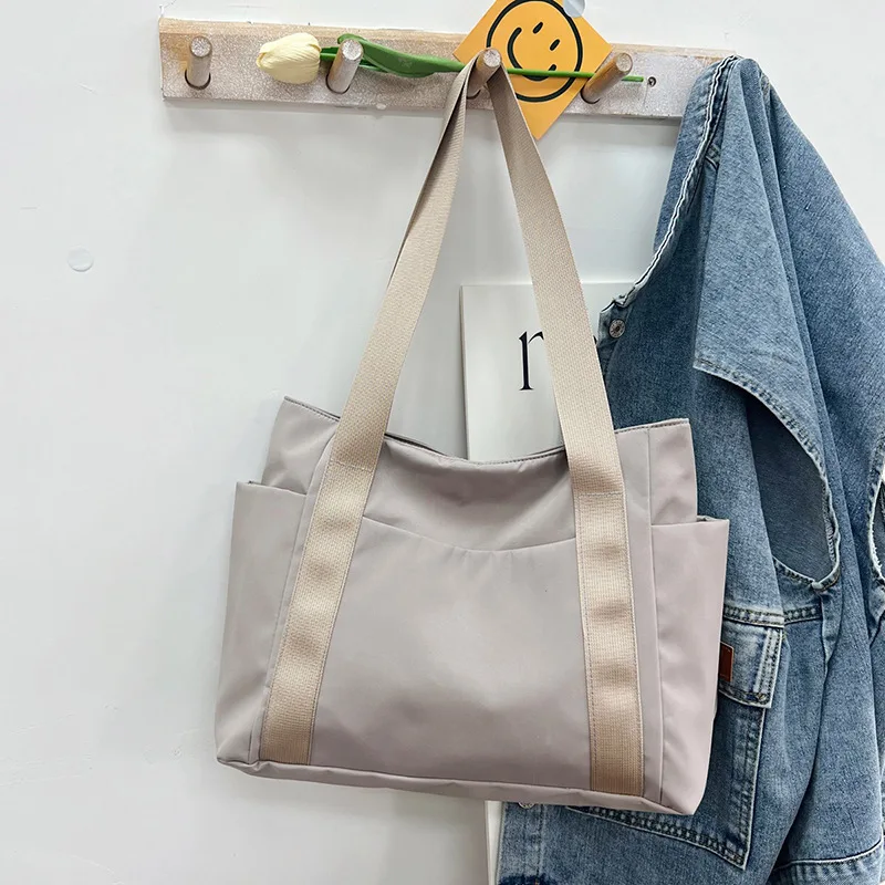 Women's Bag Designer Luxury Bag Nylon Commuting Shoulder Handbag Solid Color Tote Bag Mommy Large Capacity Vacation Handbag 2026