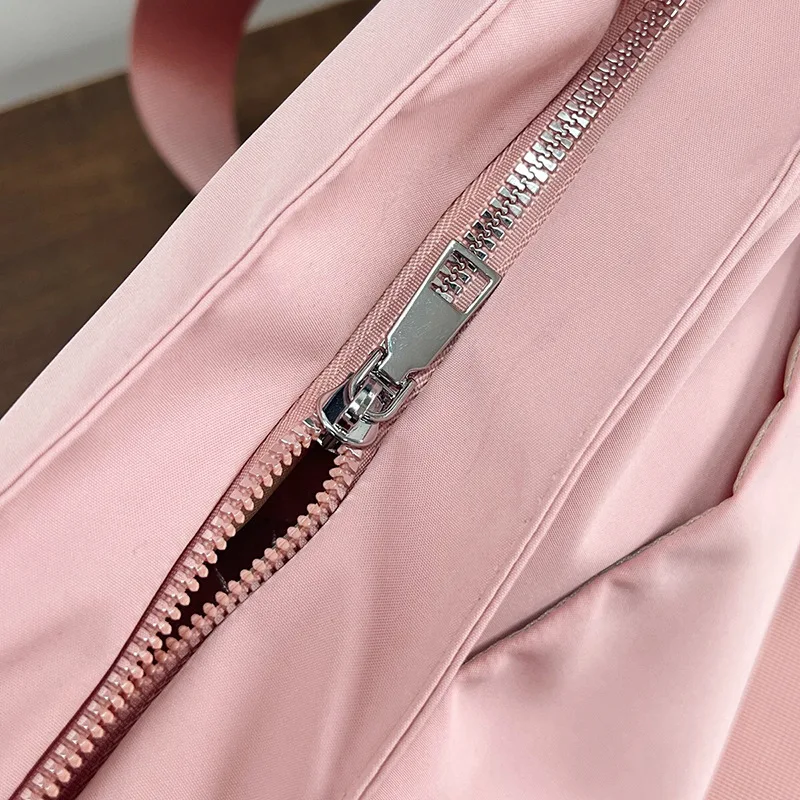 Women's Bag Designer Luxury Bag Nylon Commuting Shoulder Handbag Solid Color Tote Bag Mommy Large Capacity Vacation Handbag 2026