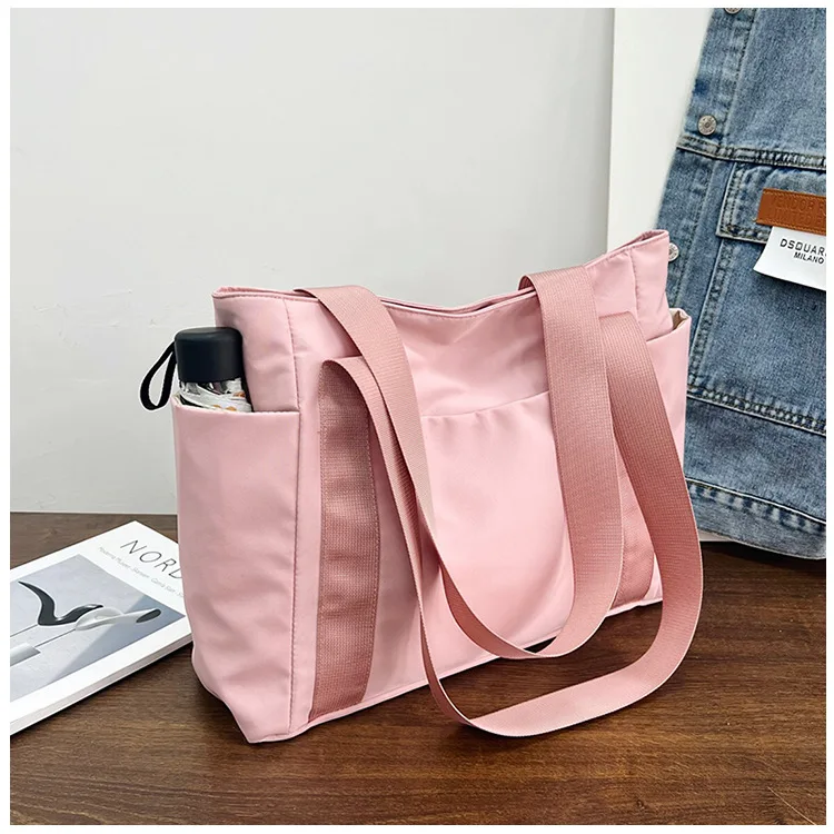 Women's Bag Designer Luxury Bag Nylon Commuting Shoulder Handbag Solid Color Tote Bag Mommy Large Capacity Vacation Handbag 2026