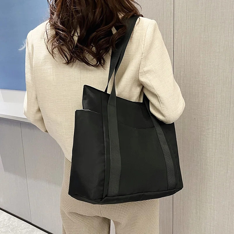 Women's Bag Designer Luxury Bag Nylon Commuting Shoulder Handbag Solid Color Tote Bag Mommy Large Capacity Vacation Handbag 2026
