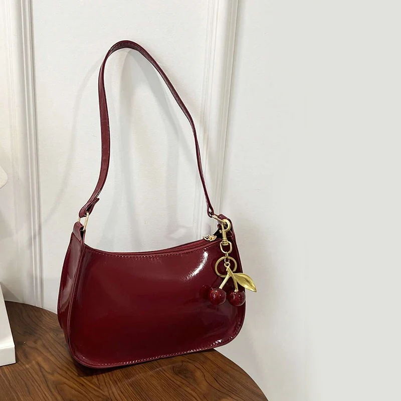 Women's PU Leather Handbag Versatile Fashion Solid Color Cherry Pendant Shoulder Bag Casual Commuting Bag Underarm Bag