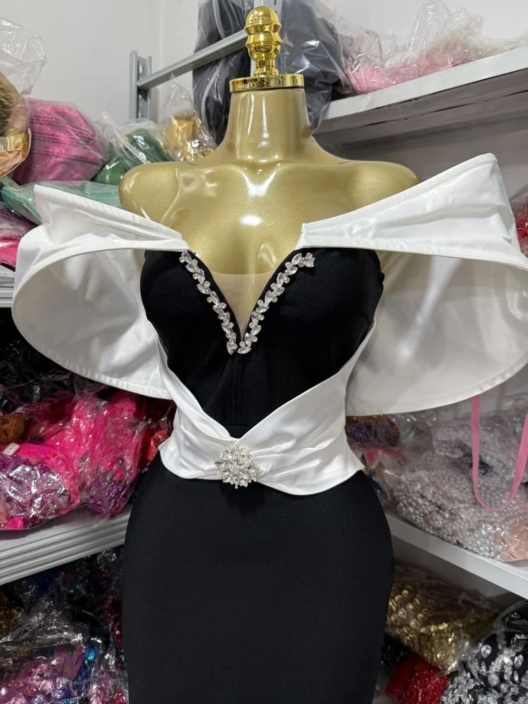 Sexy Women's Dress With Large Shoulders In White And a Cinched Waist With a v-Neck, Long Backless Bandage, And a Long Dress For