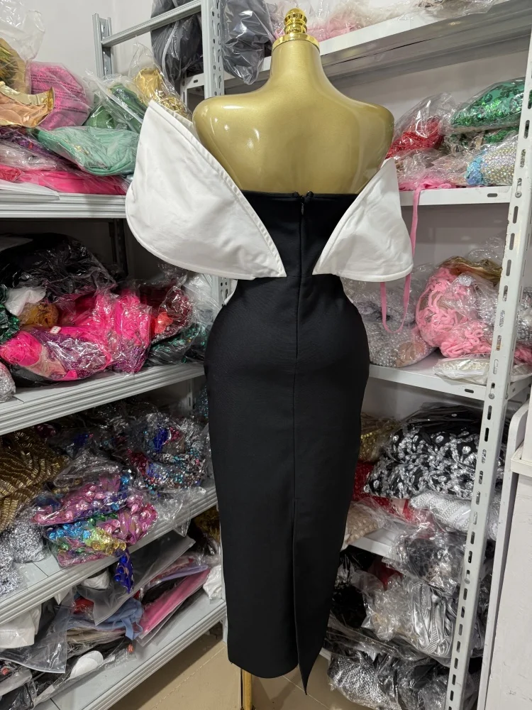 Sexy Women's Dress With Large Shoulders In White And a Cinched Waist With a v-Neck, Long Backless Bandage, And a Long Dress For