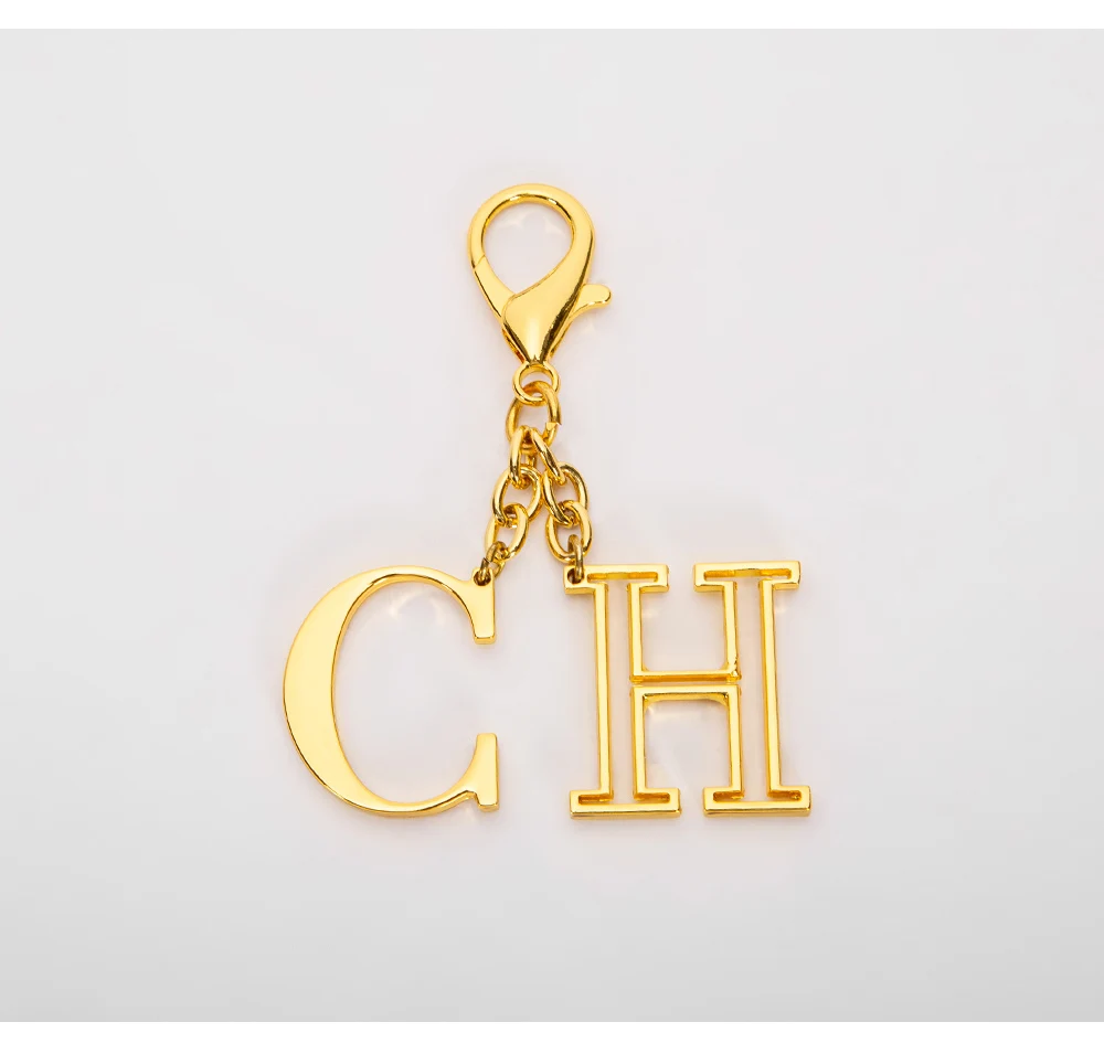 CHCH Luxury Brand Fashion Luggage Accessories Keychain Luggage Pendant Simple Fashion Hollow out Letter Titanium Alloy Jewelry