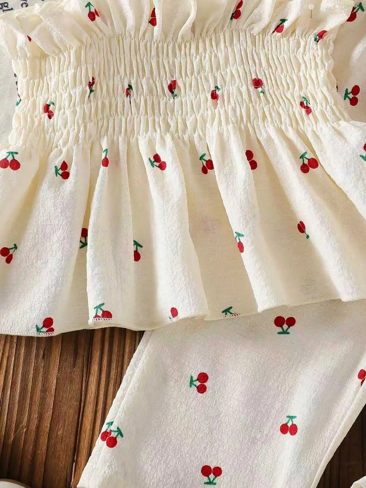 Summer baby girl white cherry print camisole top paired with matching pants in two pieces