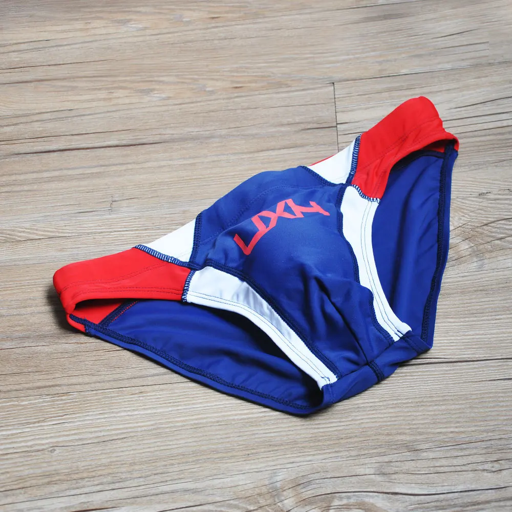2026 warehouse real shot men's fashion stitching briefs Japanese show beach swimming trunks close-fitting briefs UXH026