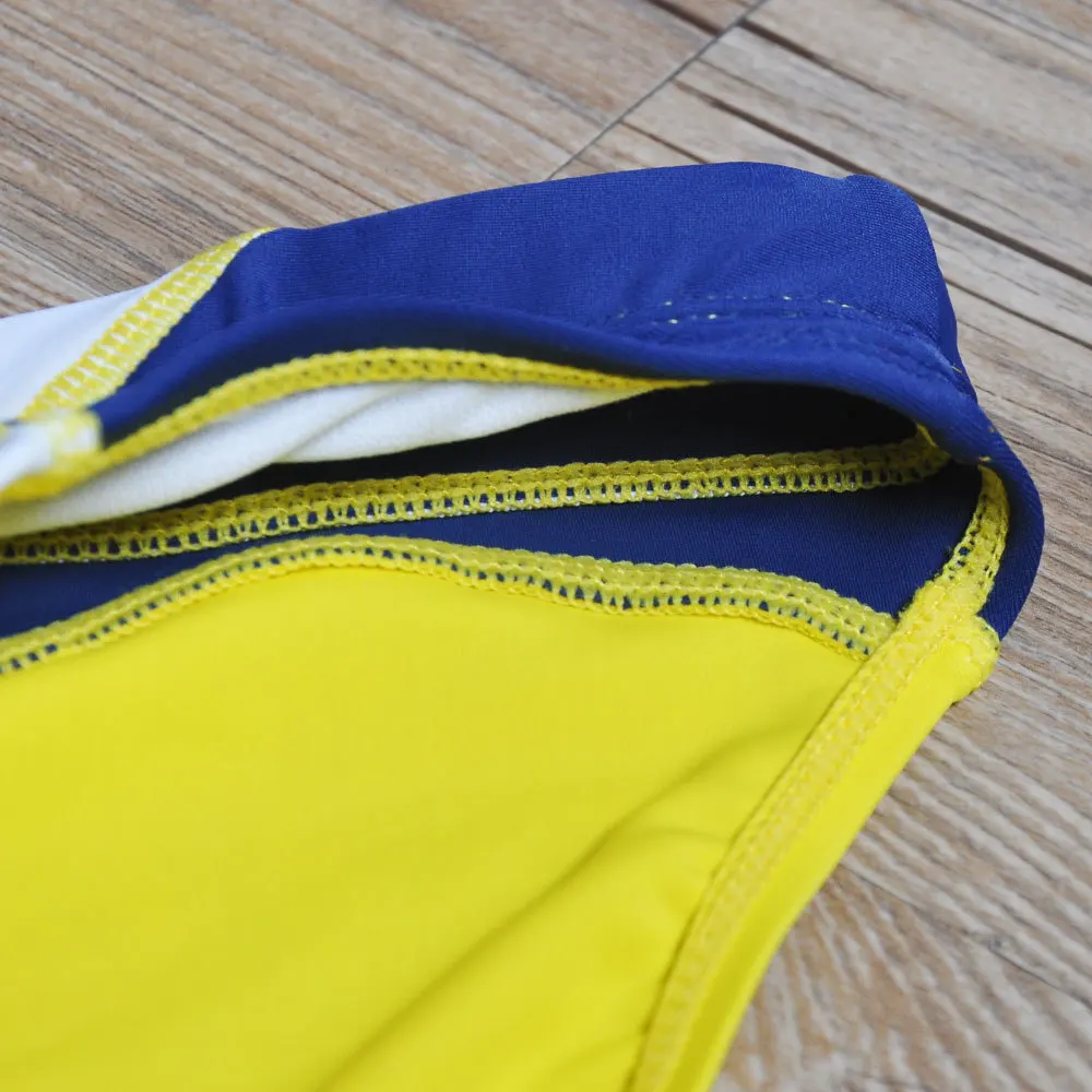 2026 warehouse real shot men's fashion stitching briefs Japanese show beach swimming trunks close-fitting briefs UXH026