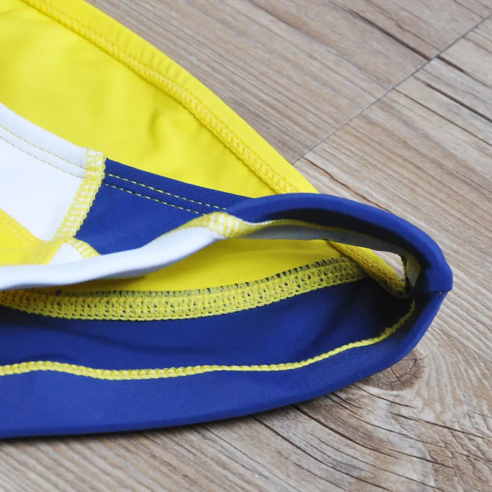 2026 warehouse real shot men's fashion stitching briefs Japanese show beach swimming trunks close-fitting briefs UXH026