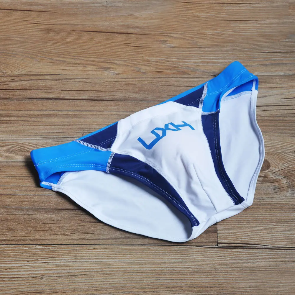 2026 warehouse real shot men's fashion stitching briefs Japanese show beach swimming trunks close-fitting briefs UXH026
