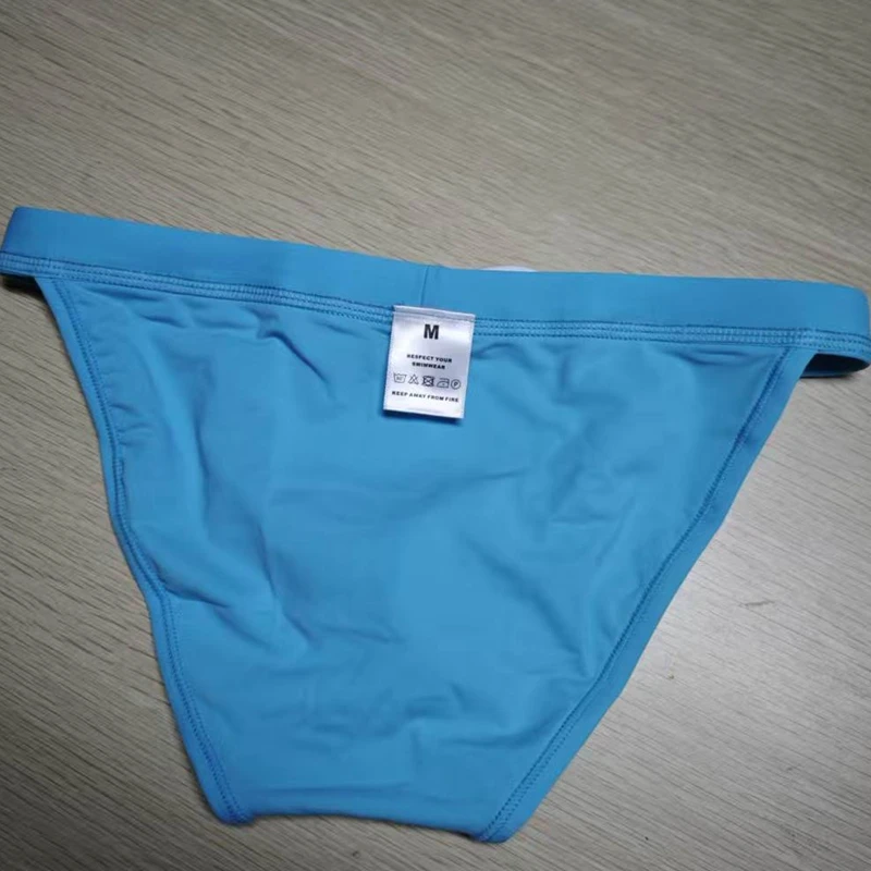 2026 New's slender waist men's swimming trunks foreign trade triangle swimsuit European and American new fashion D101