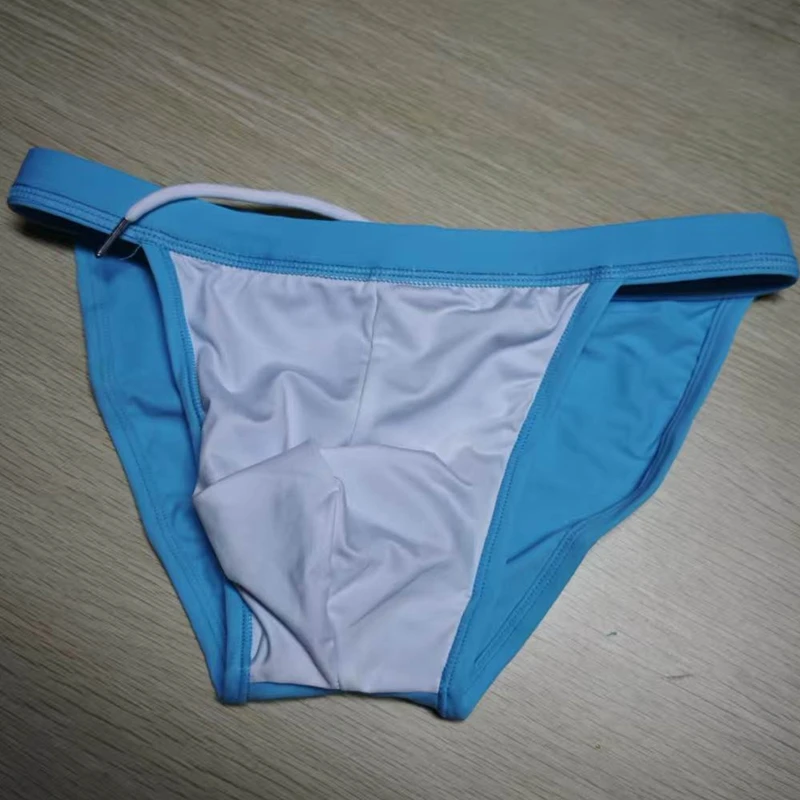 2026 New's slender waist men's swimming trunks foreign trade triangle swimsuit European and American new fashion D101