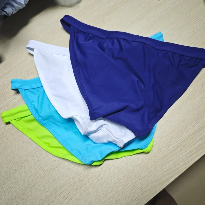 2026 New's slender waist men's swimming trunks foreign trade triangle swimsuit European and American new fashion D101