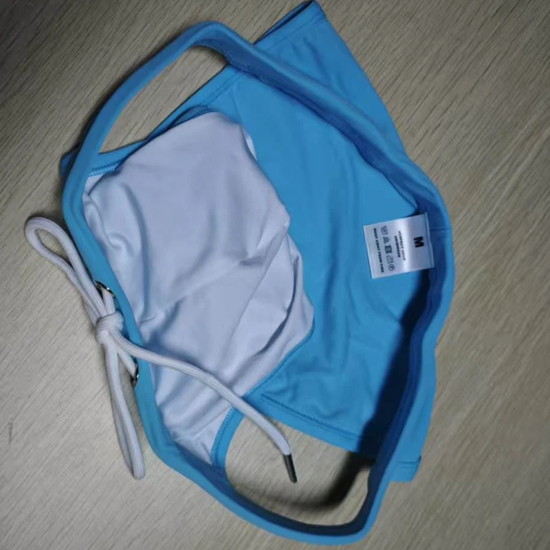 2026 New's slender waist men's swimming trunks foreign trade triangle swimsuit European and American new fashion D101