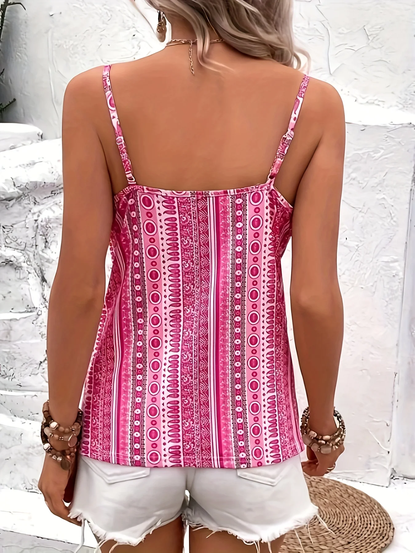 Women's sexy V-neck chain printed front twisted back camisole top, made of polyester fabric with spaghetti pattern