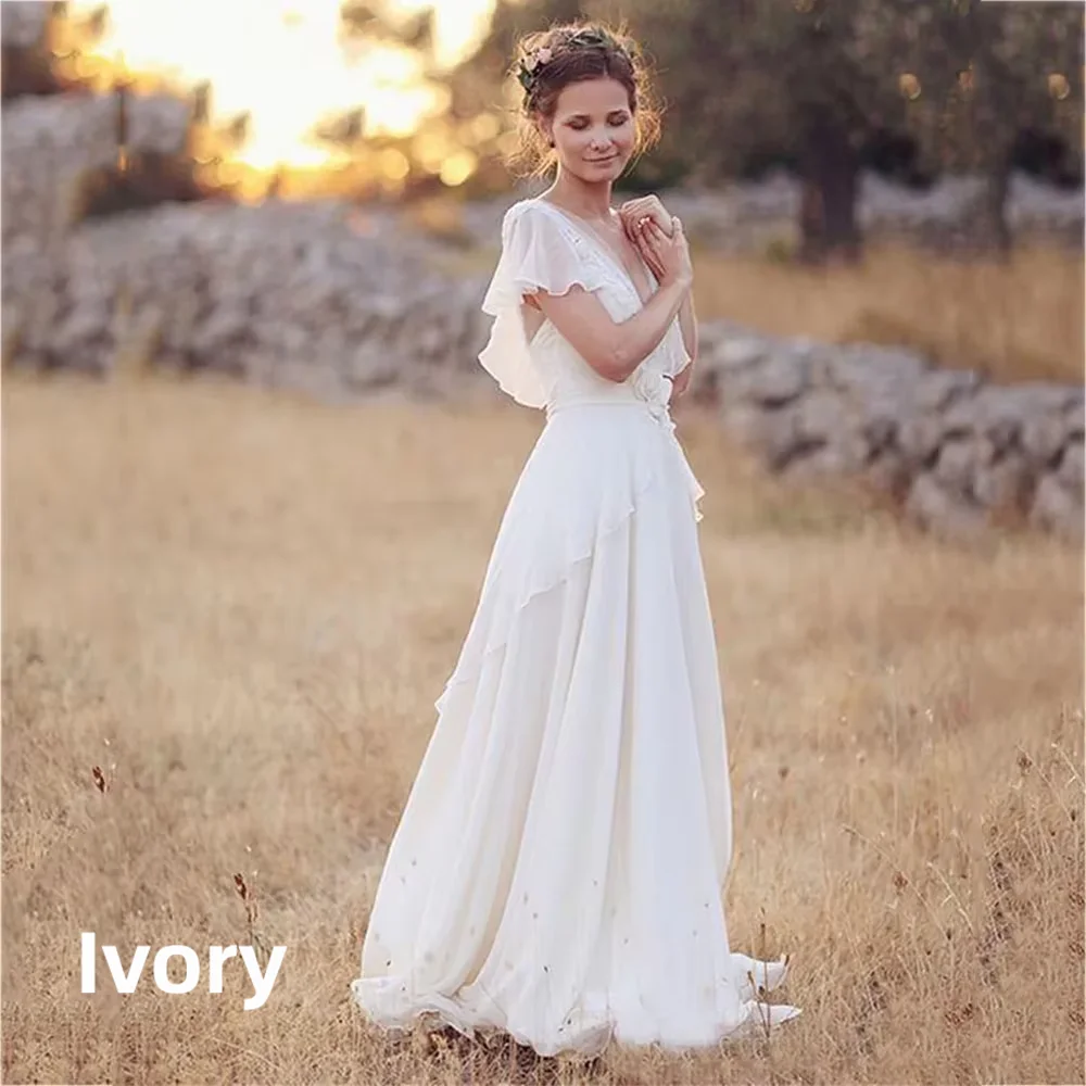 Bohemian Chiffon Wedding Dress Deep V Neck Ruffle Short Sleeve Lace Appliques Backless A-Line Bridal Gown Beach Wedding Dress