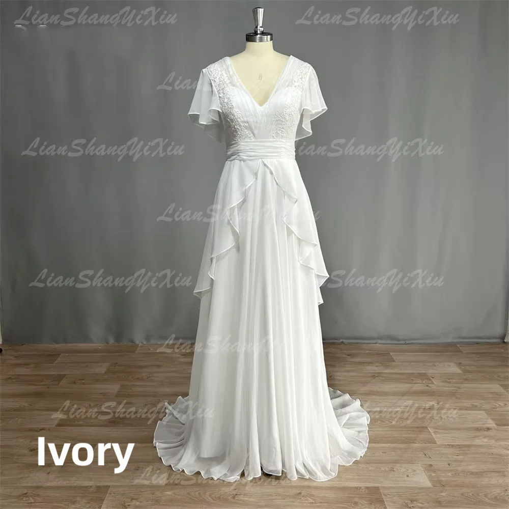 Bohemian Chiffon Wedding Dress Deep V Neck Ruffle Short Sleeve Lace Appliques Backless A-Line Bridal Gown Beach Wedding Dress
