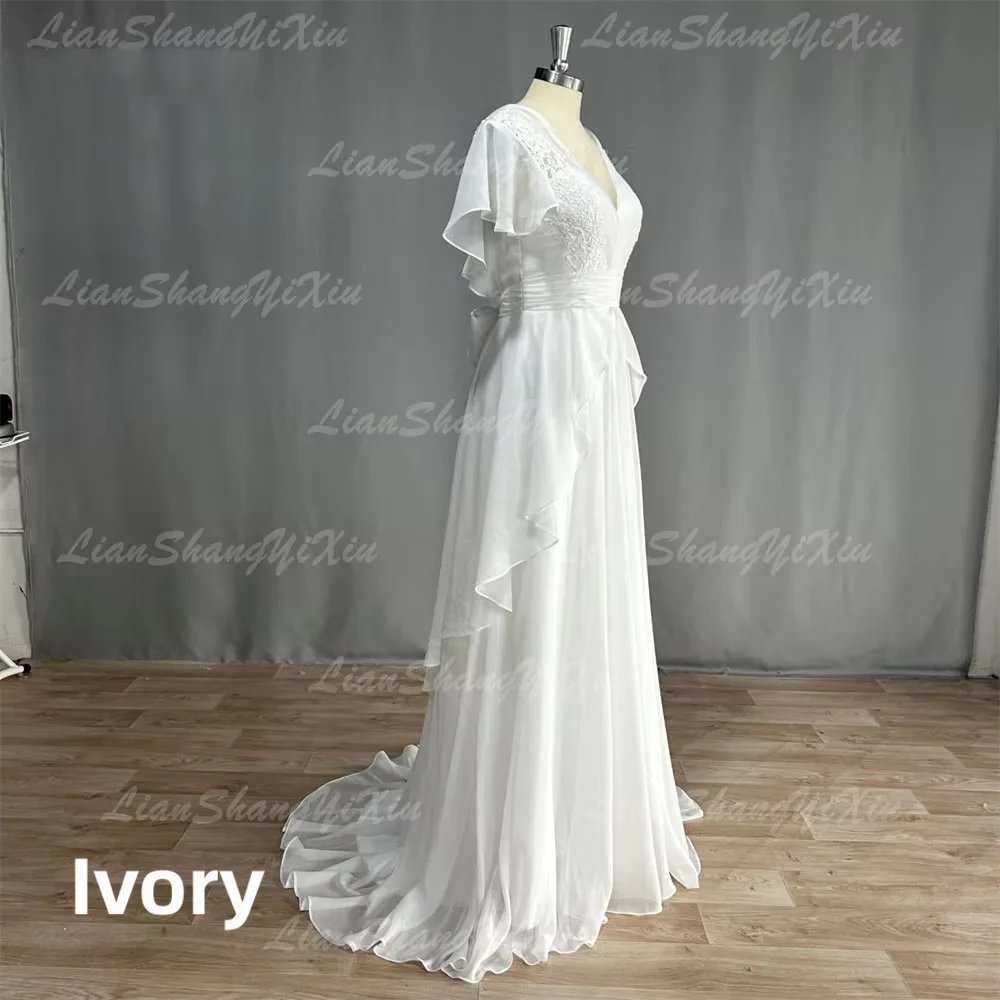 Bohemian Chiffon Wedding Dress Deep V Neck Ruffle Short Sleeve Lace Appliques Backless A-Line Bridal Gown Beach Wedding Dress