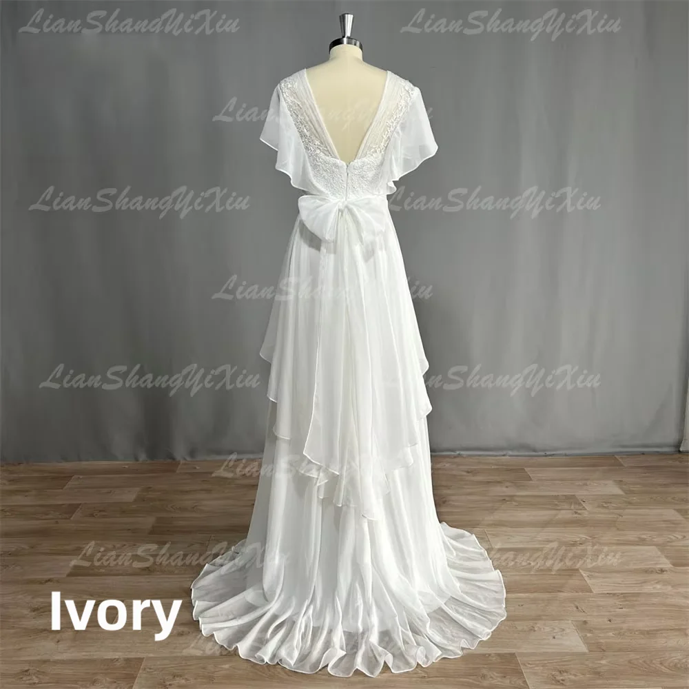Bohemian Chiffon Wedding Dress Deep V Neck Ruffle Short Sleeve Lace Appliques Backless A-Line Bridal Gown Beach Wedding Dress