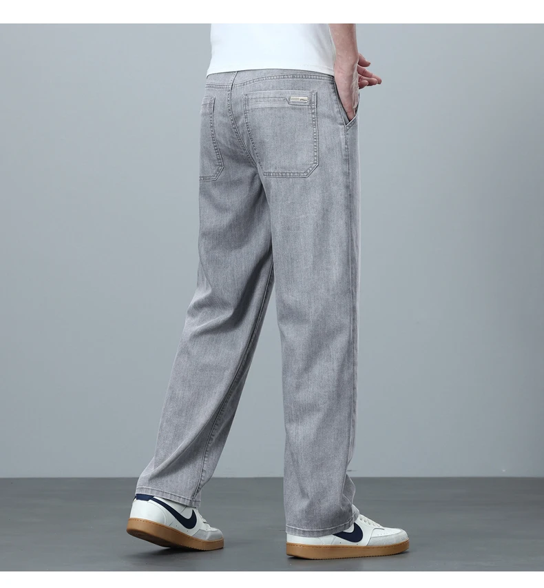 High Quality Spring Summer Lyocell Men's Jeans Loose Straight Wide Leg Casual With Slant Pockets Trousers Male Plus Size 40