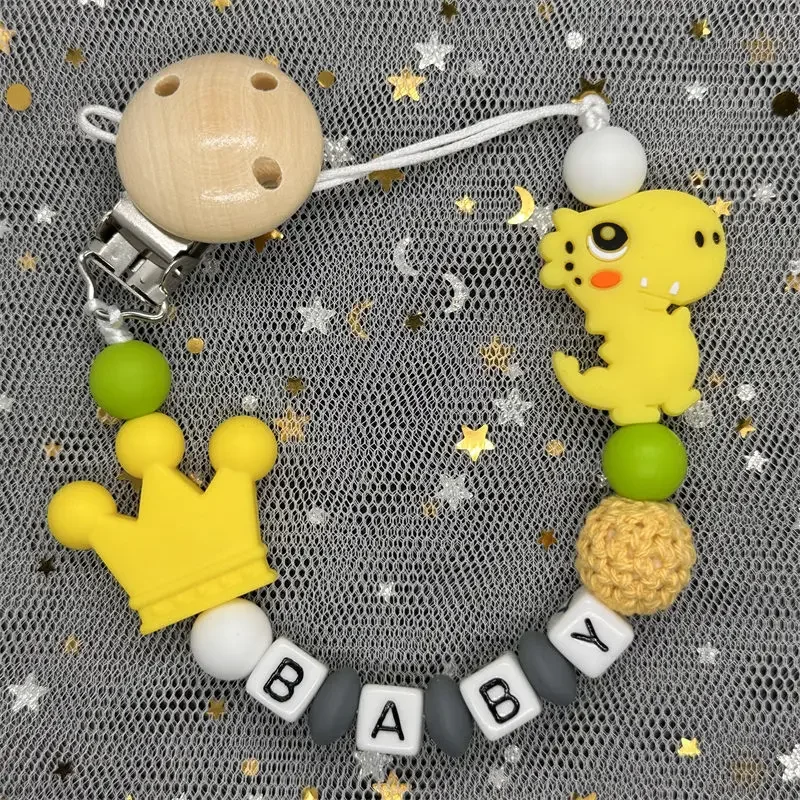 Hot Sale Custom Personalized Name Handmade Pacifier Clip Holder Silicone Dinosaur Pacifier Chain Baby Teether Teether Chain Gift