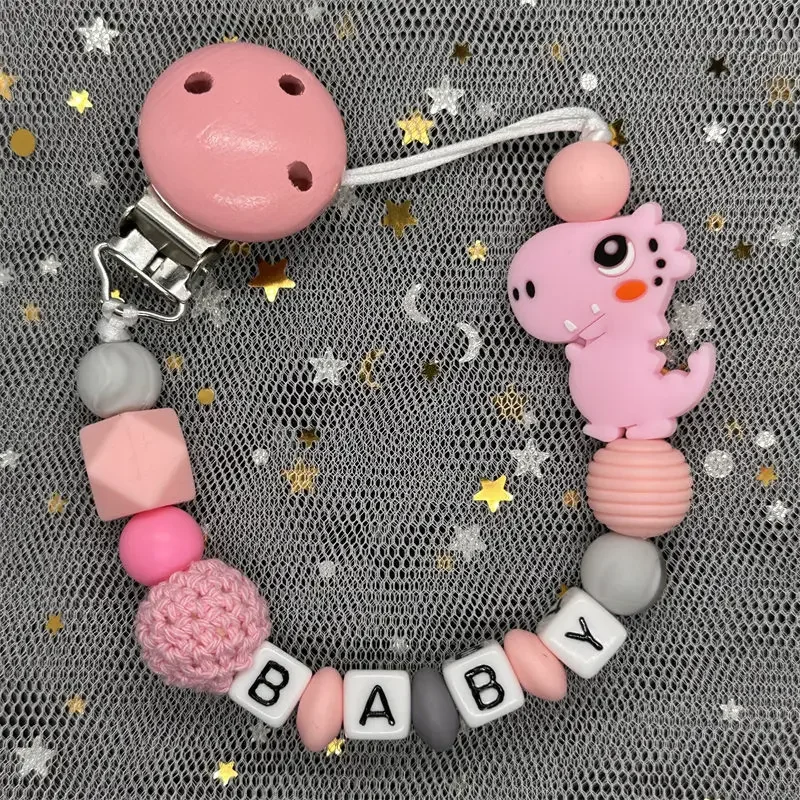 Hot Sale Custom Personalized Name Handmade Pacifier Clip Holder Silicone Dinosaur Pacifier Chain Baby Teether Teether Chain Gift