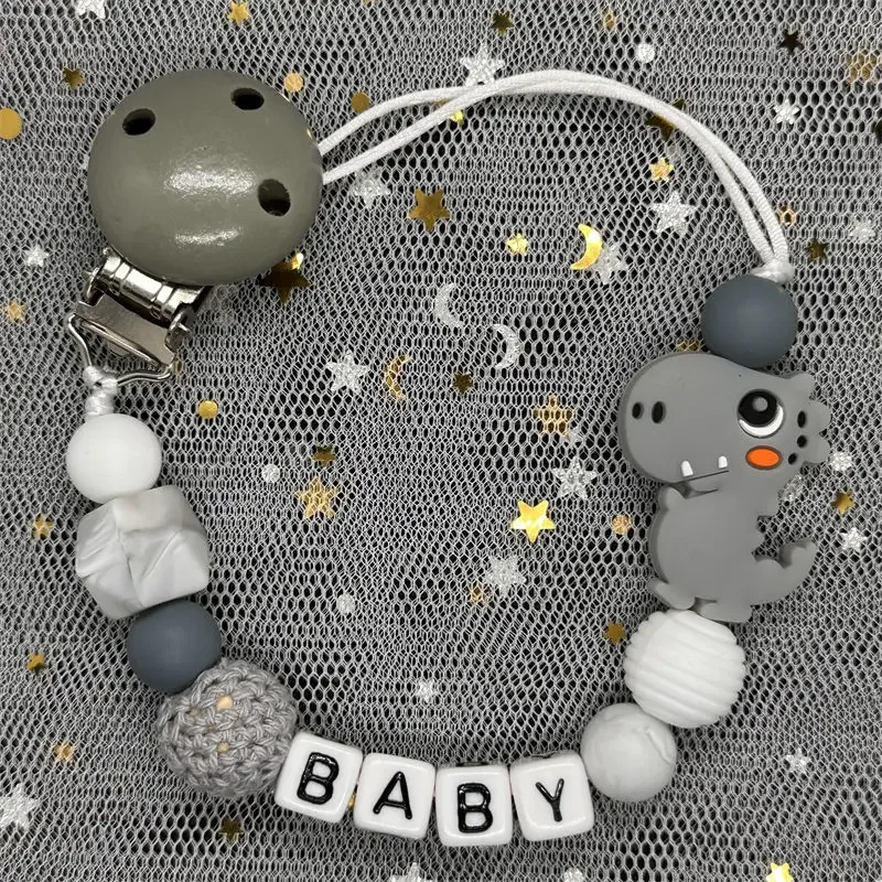 Hot Sale Custom Personalized Name Handmade Pacifier Clip Holder Silicone Dinosaur Pacifier Chain Baby Teether Teether Chain Gift