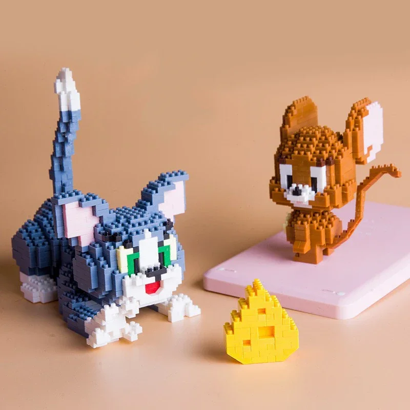 Funny Tom And Jerry Micro Building Blocks Cheese Cat and Mouse Assembly 3D Model Anime Mini Brick Figure Toy For Christmas Gift