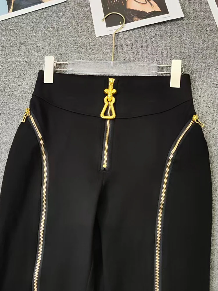 Summer women's retro irregular metal zipper design high waist feet pants fashion Joker elastic tight hip pants.