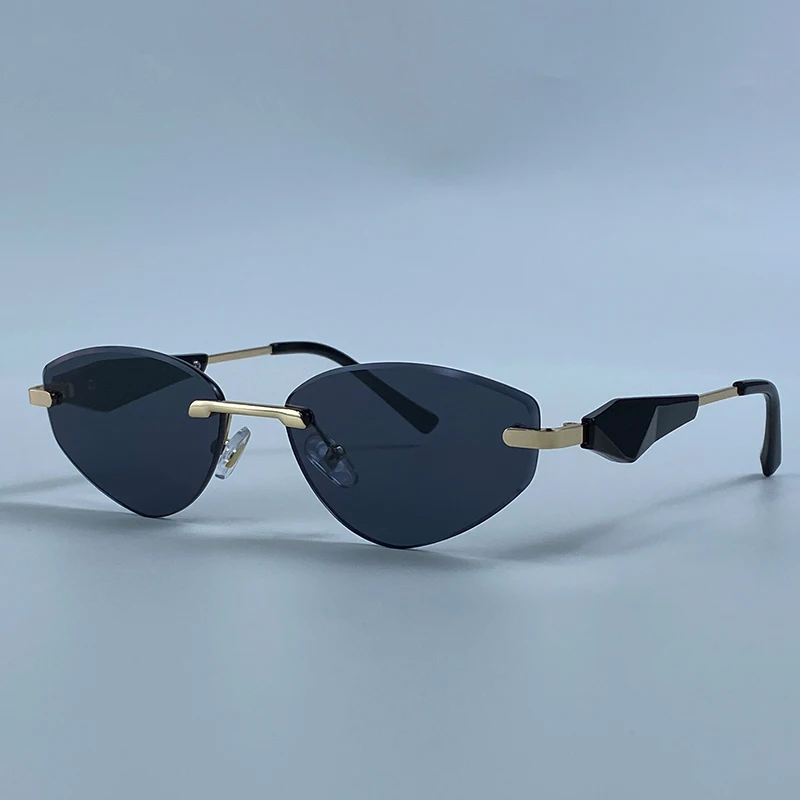 Sexy Cat Eye Rimless Punk Sunglasses Women New 2026 Luxury Designer Trendy Frameless Polygon Sun Glasses Vintage Metal Shades