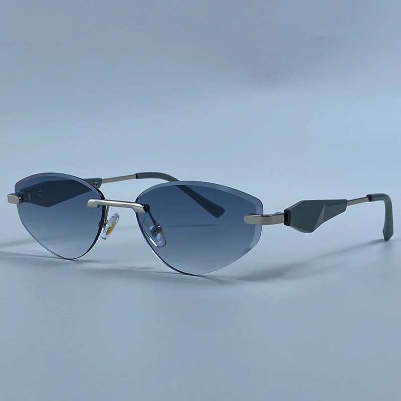 Sexy Cat Eye Rimless Punk Sunglasses Women New 2026 Luxury Designer Trendy Frameless Polygon Sun Glasses Vintage Metal Shades