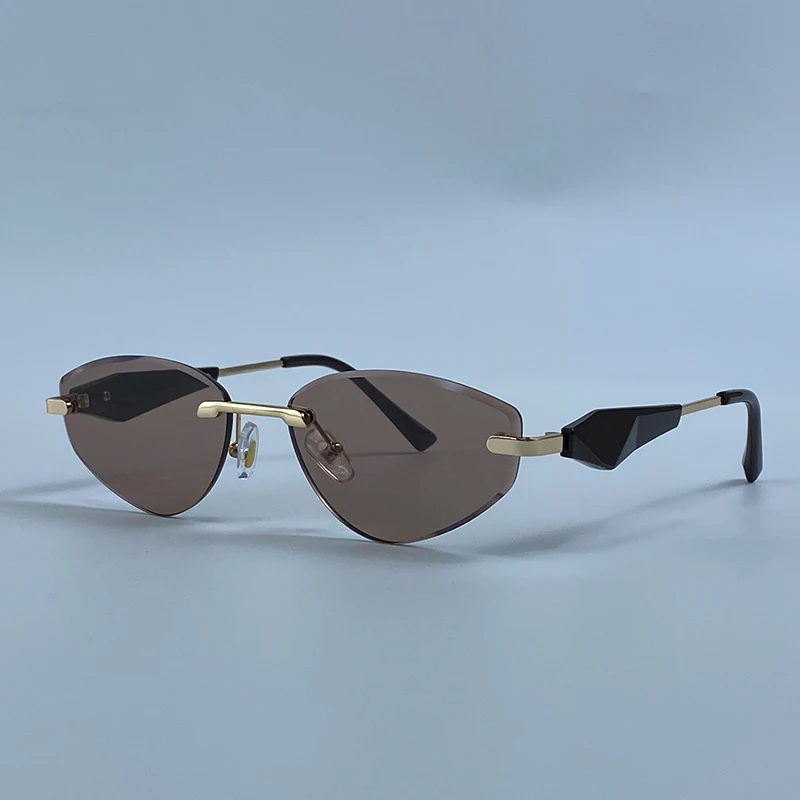Sexy Cat Eye Rimless Punk Sunglasses Women New 2026 Luxury Designer Trendy Frameless Polygon Sun Glasses Vintage Metal Shades