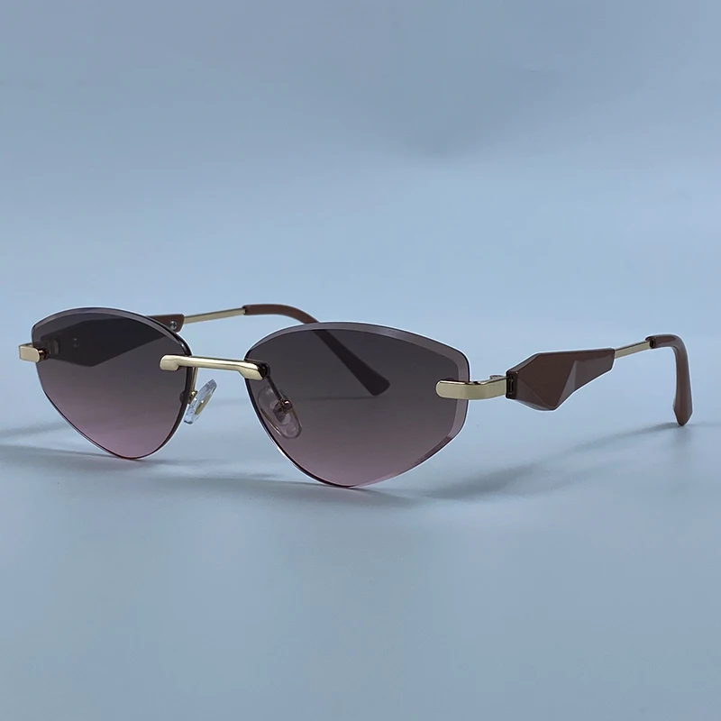 Sexy Cat Eye Rimless Punk Sunglasses Women New 2026 Luxury Designer Trendy Frameless Polygon Sun Glasses Vintage Metal Shades