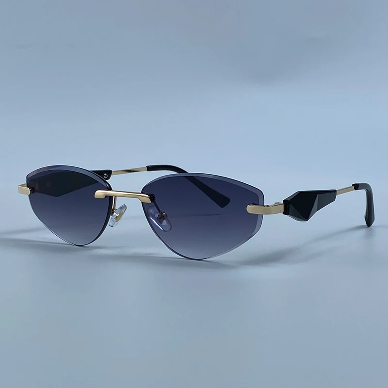 Sexy Cat Eye Rimless Punk Sunglasses Women New 2026 Luxury Designer Trendy Frameless Polygon Sun Glasses Vintage Metal Shades