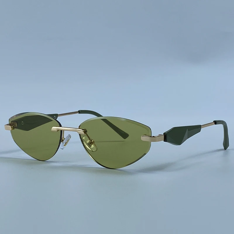 Sexy Cat Eye Rimless Punk Sunglasses Women New 2026 Luxury Designer Trendy Frameless Polygon Sun Glasses Vintage Metal Shades