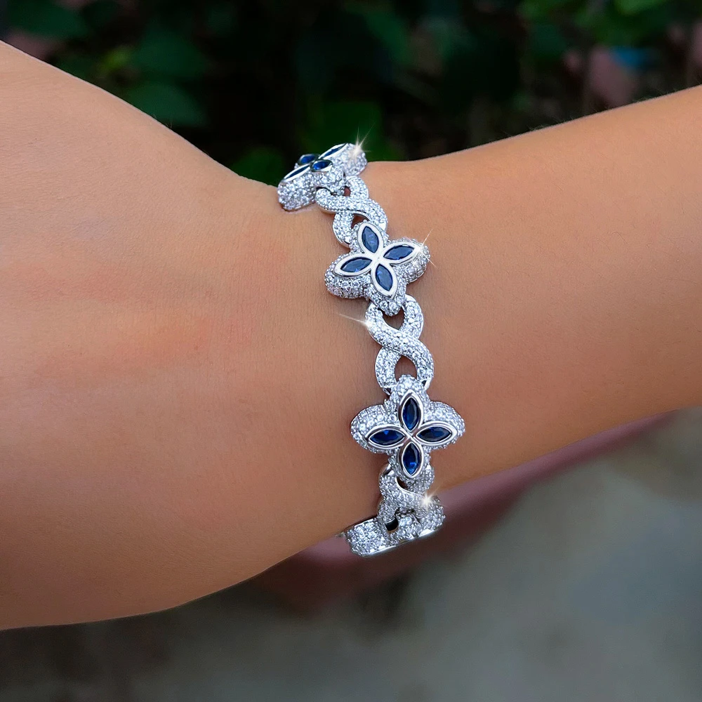 ThreeGraces Luxury Shiny Blue Zirconia Geometric Infinite Shape Bridal Wedding Lucky Leaf Link Chain Bracelet for Women Jewelry
