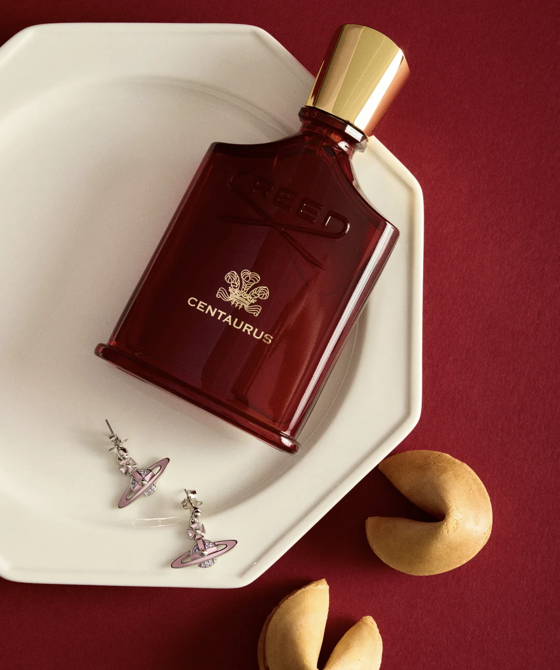 Creed Centaurus EDP with iconic red bottle. Spicy woody base enriched with smoky layers. Solid and steady aroma with great lasting power. A mature fragrance for lovers of deep, grounded scents.